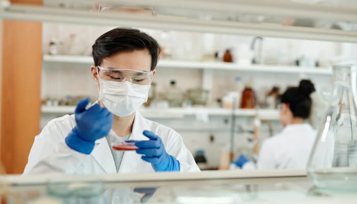 man doing a sample test in the laboratory